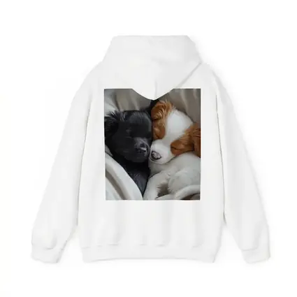 Two Sleeping Puppies Cuddled In Blankets