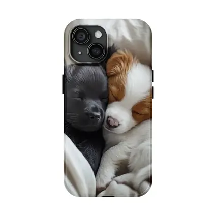Two Sleeping Puppies Cuddled In Blankets