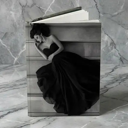 Woman Black Gown Lying on Stone Steps