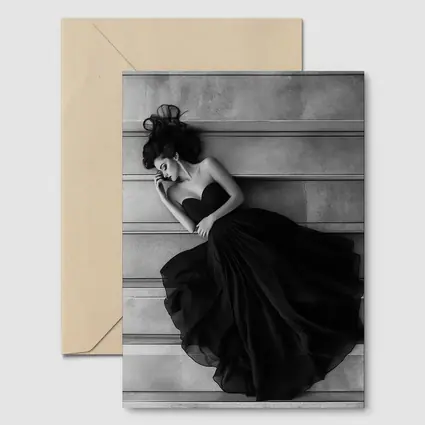 Woman Black Gown Lying on Stone Steps