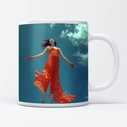 Woman Floating in Blue Sky Orange Dress