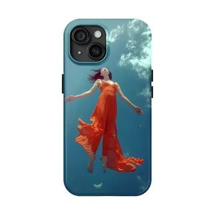 Woman Floating in Blue Sky Orange Dress