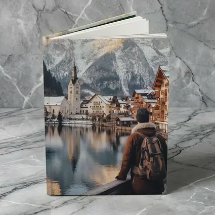 Traveler Overlooking Hallstatt Alpine Lake Village