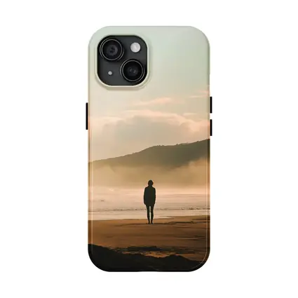 Lone Woman Standing On Misty Beach Shore