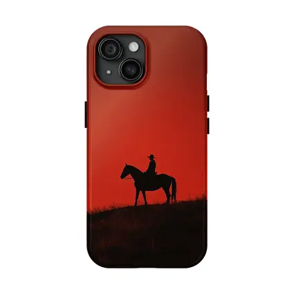 Cowboy Silhouette on Horse Red Sky