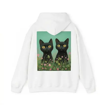 Two Black Cats Among Pink Wildflowers