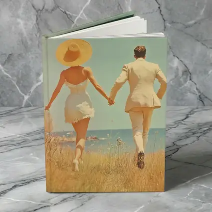 Couple Holding Hands Walking Toward Ocean