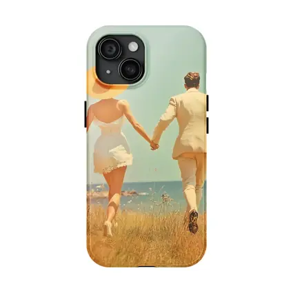 Couple Holding Hands Walking Toward Ocean