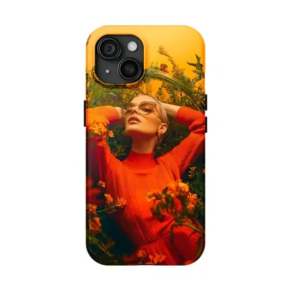 Woman in Orange Dress Among Wildflowers