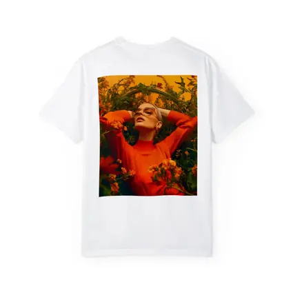 Woman in Orange Dress Among Wildflowers