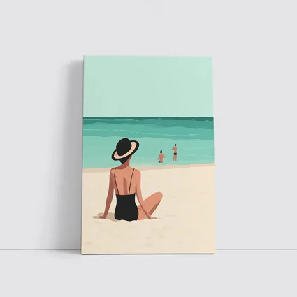 Woman In Hat Sitting On Beach