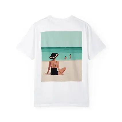 Woman In Hat Sitting On Beach