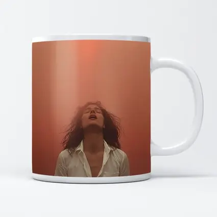 Woman Head Back Warm Orange Misty Background