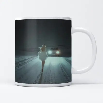 Woman Walking Snowy Road At Night