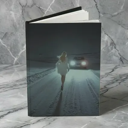 Woman Walking Snowy Road At Night
