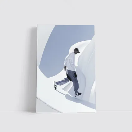 Man Running Through White Architectural Curves