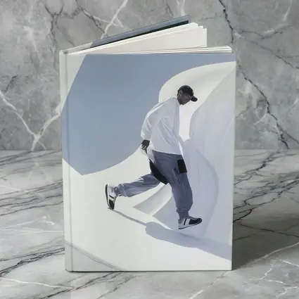 Man Running Through White Architectural Curves