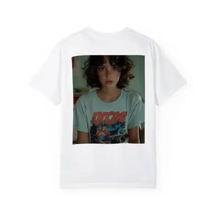 Young Girl Wearing Graphic Tee Classroom