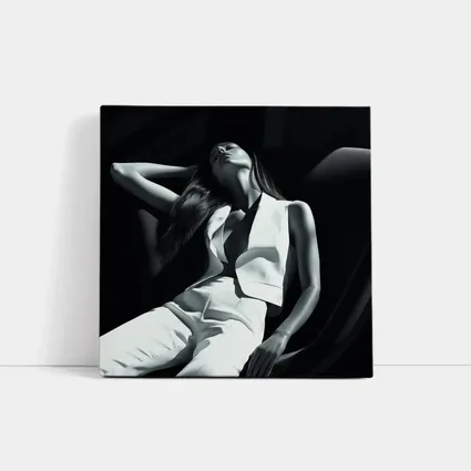 Woman in White Suit Dark Chair