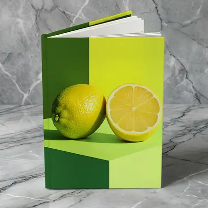 Fresh Lemon Halved On Green Background