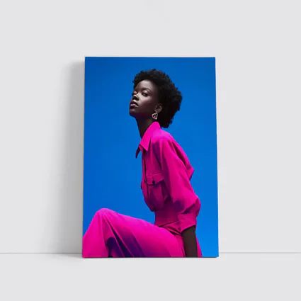 Woman in Magenta Outfit Against Blue Sky