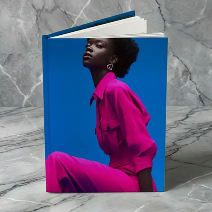 Woman in Magenta Outfit Against Blue Sky