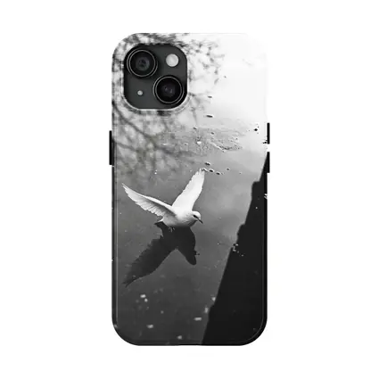 White Dove Flying Over Dark Water