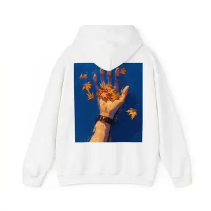 Hand Holding Autumn Leaves Over Blue Water