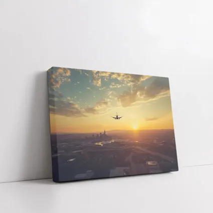 Airplane Silhouette Flying Over City Sunset