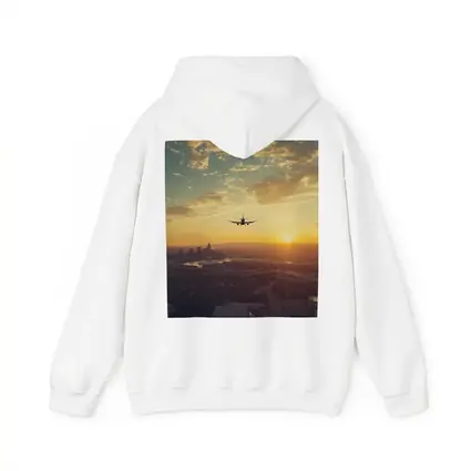 Airplane Silhouette Flying Over City Sunset
