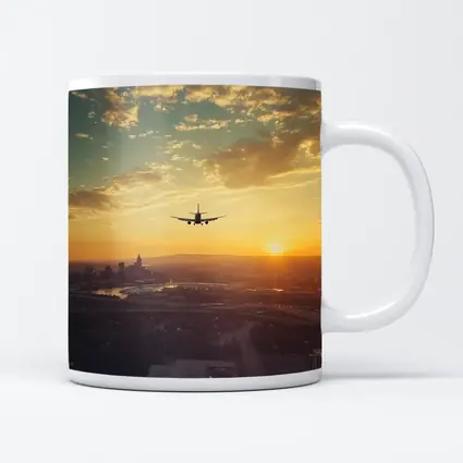 Airplane Silhouette Flying Over City Sunset