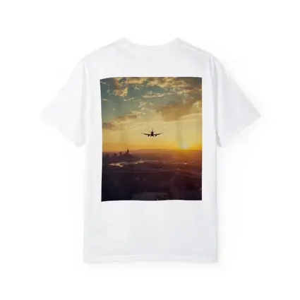 Airplane Silhouette Flying Over City Sunset