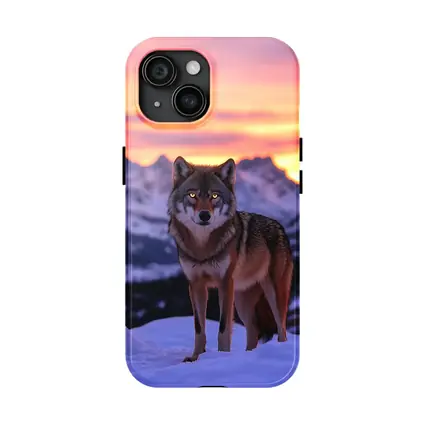 Gray Wolf Standing in Snowy Mountain Sunset
