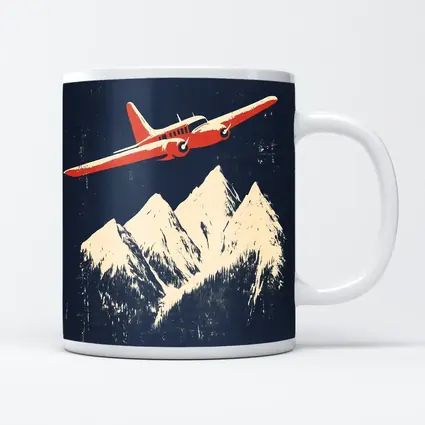 Red Vintage Plane Flying Over Snowy Mountains