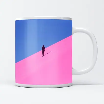 Man in Suit Climbing Pink Sand Dune