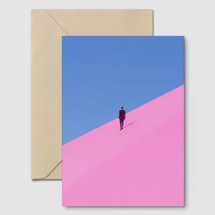 Man in Suit Climbing Pink Sand Dune