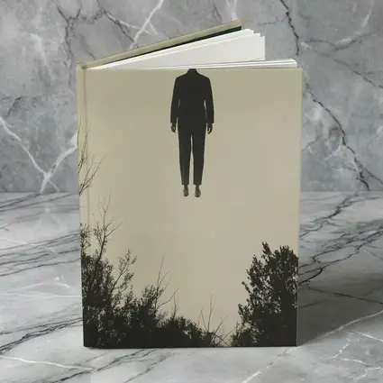 Floating Man Silhouette Above Dark Trees