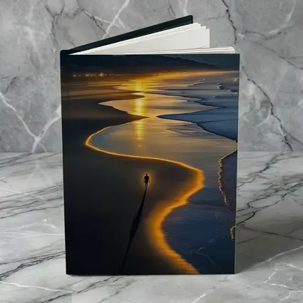 Lone Figure Walking Glowing Beach At Night