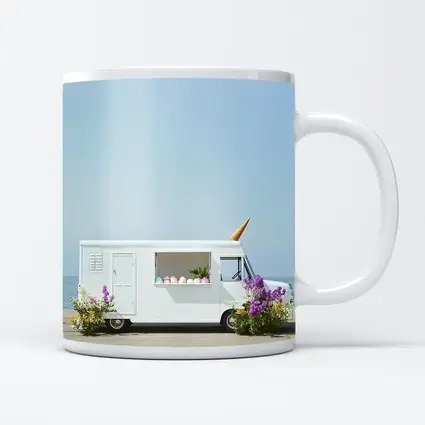 White Ice Cream Truck Beside Ocean Shore