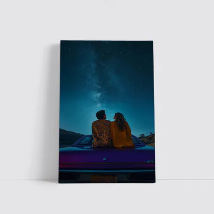 Couple Sitting on Car Under Starry Sky