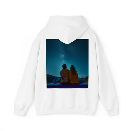 Couple Sitting on Car Under Starry Sky
