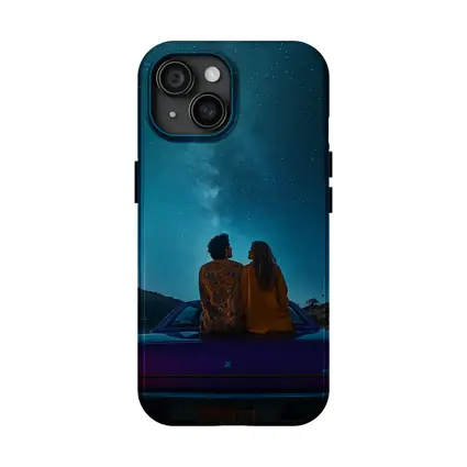 Couple Sitting on Car Under Starry Sky
