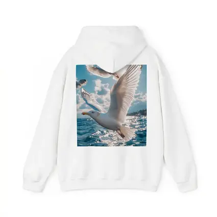 Seagulls Flying Over Sparkling Blue Ocean