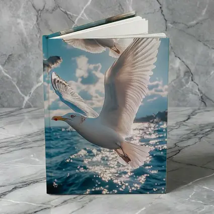 Seagulls Flying Over Sparkling Blue Ocean