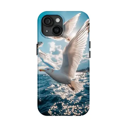 Seagulls Flying Over Sparkling Blue Ocean