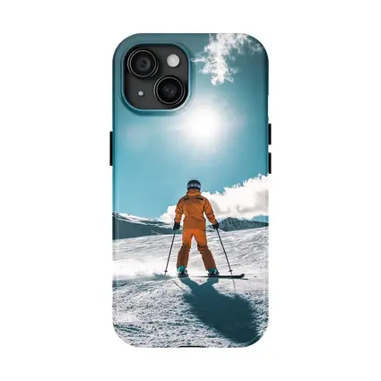 Skier In Orange Suit Sunny Snow Mountain