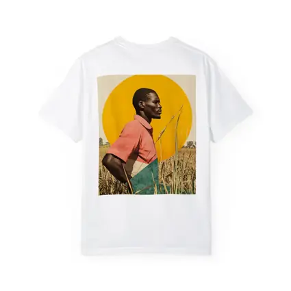 Young Man Standing in Golden Wheat Field