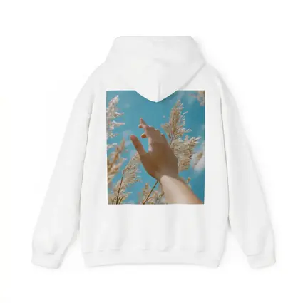 Hand Reaching Through Golden Wheat Blue Sky