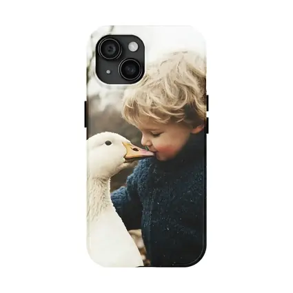 Child Kissing White Goose Outdoors