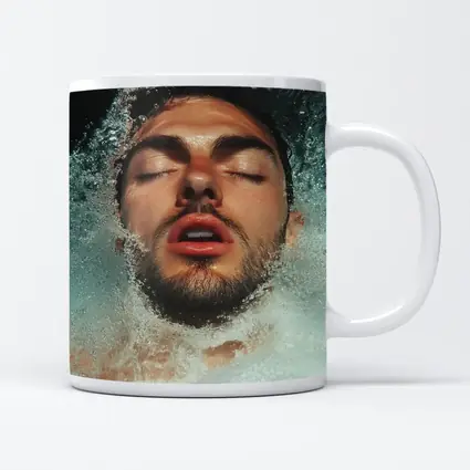 Man Emerging From Water Eyes Closed